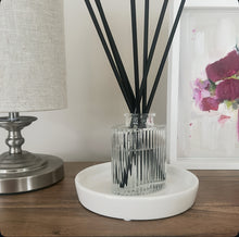 Daisy Blue Home Fragrance Rivelle Reed Diffuser bottle with natural reed sticks for home scent diffusion
